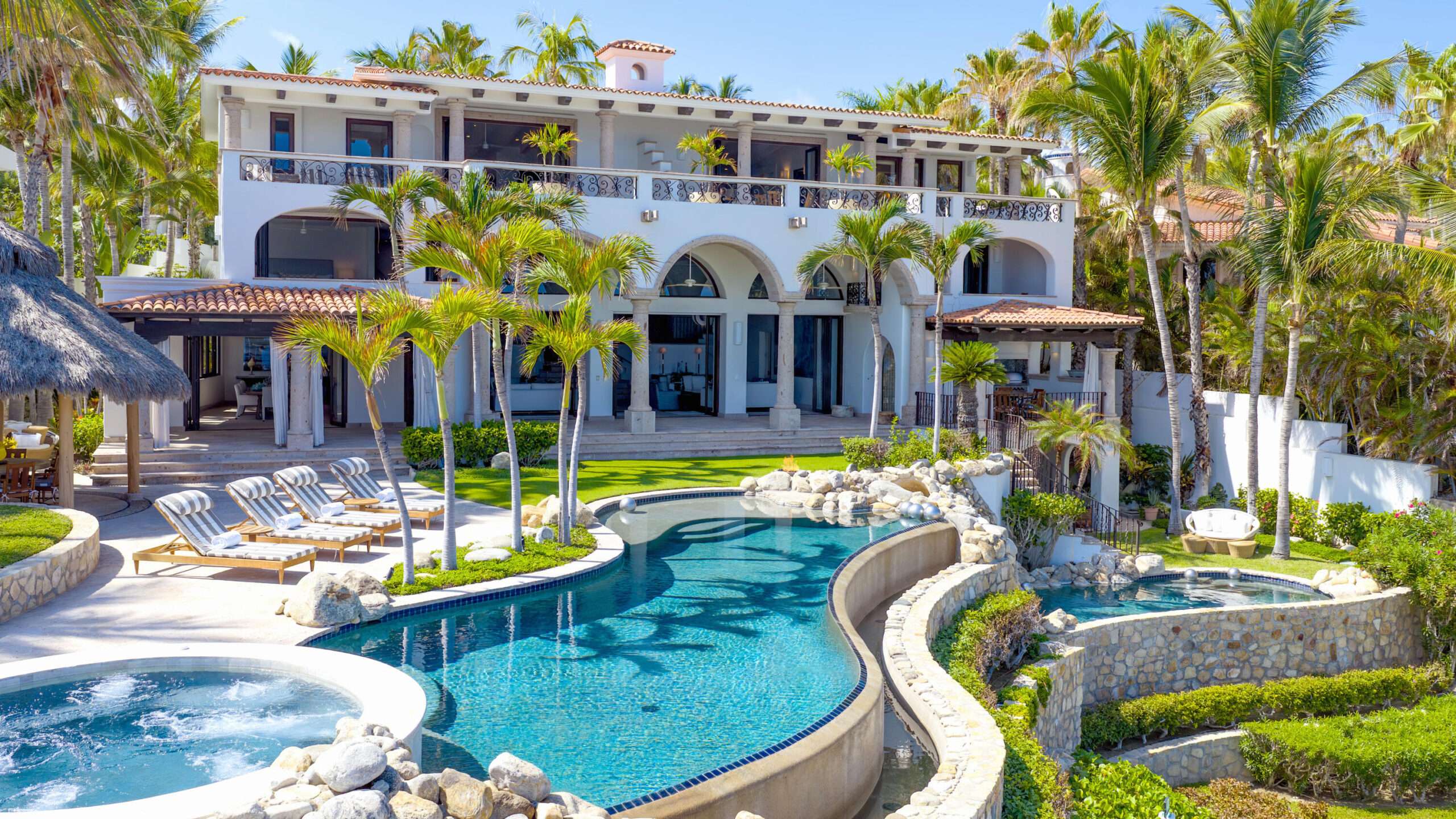 Cabo Golf La Caleta Casa Hendo is a stunning oceanfront estate perched above a swimmable cove, offering breathtaking Sea of Cortez for sale