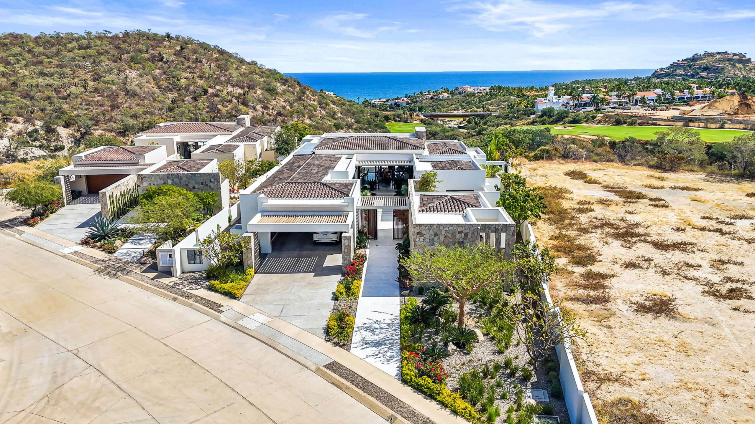 Cabo Golf Section 18- Horizontes A stunning entry flanked on both sides by art display walls sets the tone for this contemporary masterpiece located in the Private Golf and Beach community of Querencia. Thoughtful architecture helps create a seamless transition from indoor to outdoor spaces complete with a resort style pool, lush landscaping, fire pit plus double sided fireplace, outdoor bar and full pool bath with shower. This beautifully furnished home has 4 bedrooms,6.5 baths which includes a one of a kind master-bedroom suite with his and her baths and a designers dream closet that could easily convert back to the original 5 bedroom floor plan. Completed in 2023, this almost new smart home features the latest technology and top of the line appliances, plus a full house solar system and hurricane shutters. for sale